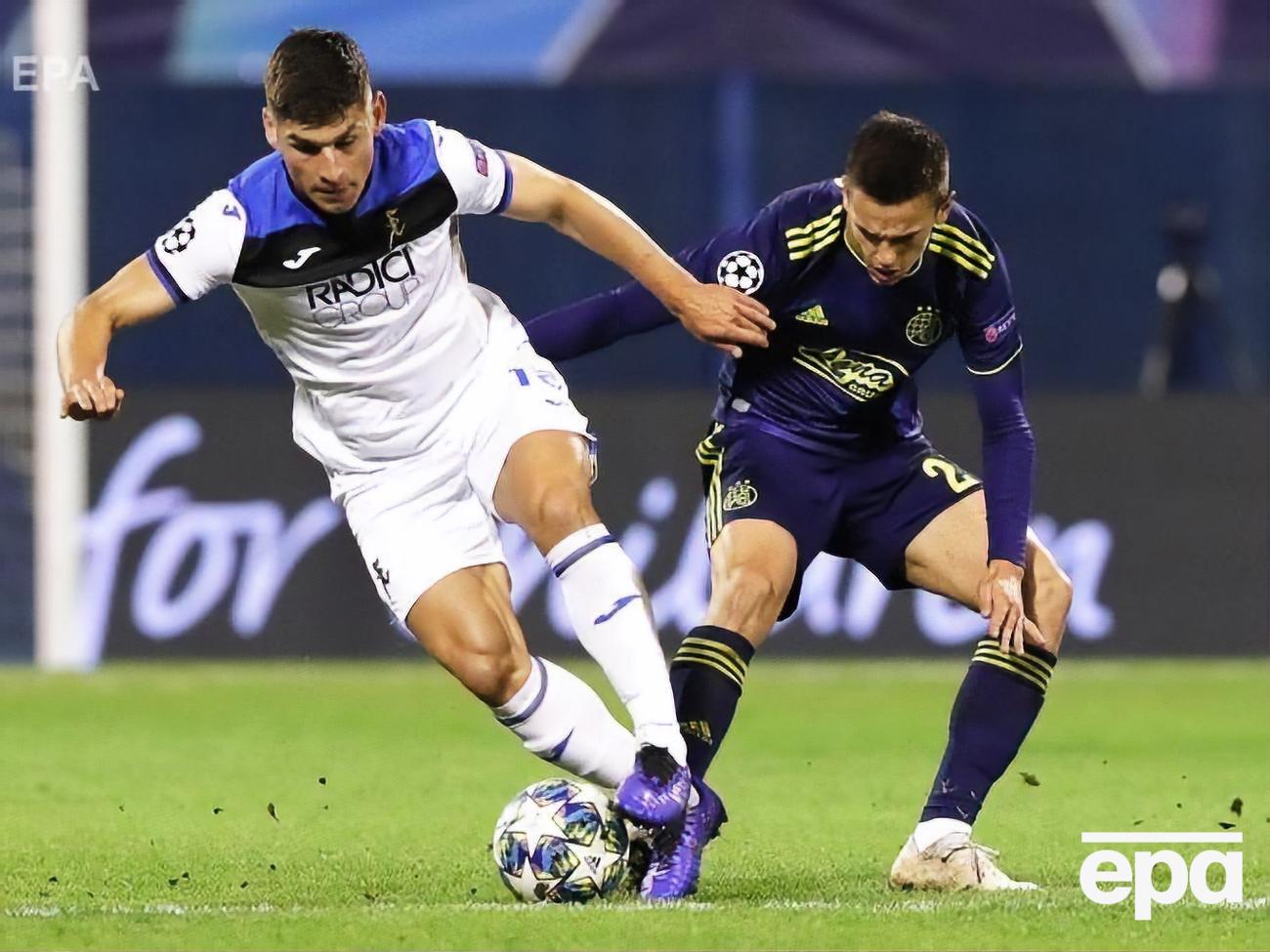 Малиновский (слева) вышел на поле на 64-й, а забил гол на 72-й минуте