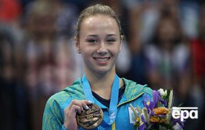 Варинская одержала медаль на разновысоких брусьях
