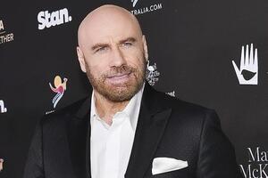 Траволта – отец 20-летней Элли и девятилетнего Бенджамина