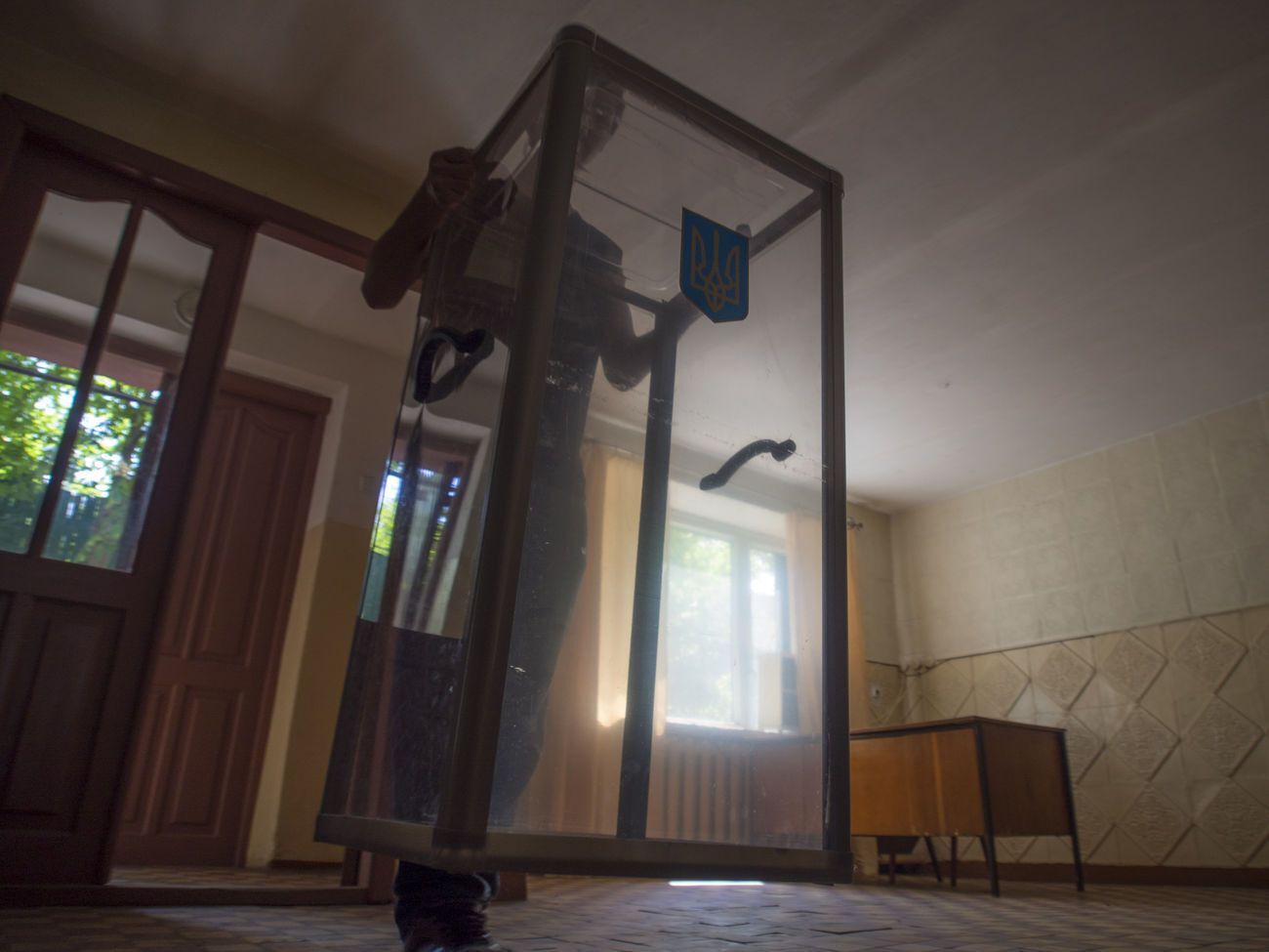 Местные выборы в Украине должны пройти в последнее воскресенье октября