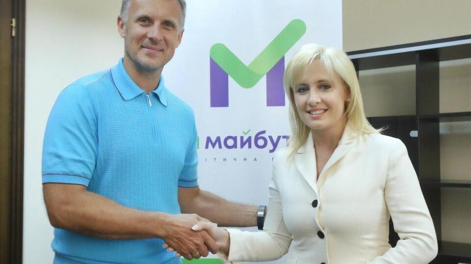 Координатор избирательного штаба партии "За майбутнє" Ярослав Москаленко и заместитель председателя Аграрной партии Украины Инна Костыря
