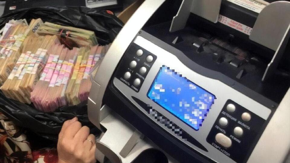Полиция изъяла компьютеры, мобильные телефоны, банковские карты и 1 млн грн наличными