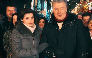 Во время поздравления Порошенко выступал вместе с женой Мариной