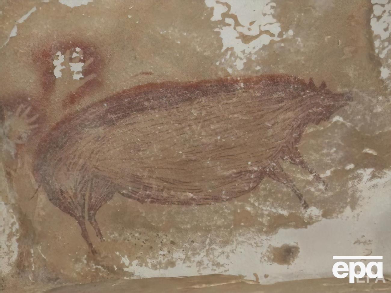 Рисунок выполнен красной охрой