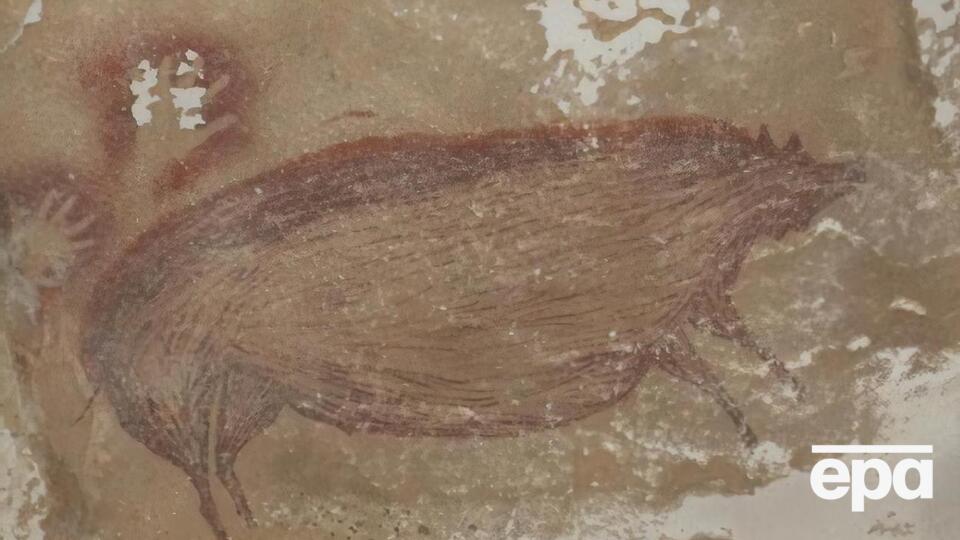 Рисунок выполнен красной охрой