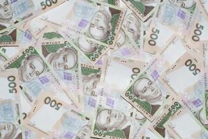 Гривня щодо долара подешевшала на одну копійку