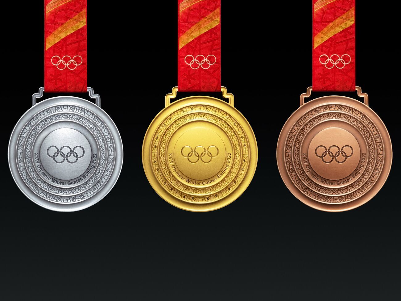 Форма медалей зимних Игр в Пекине напоминает награды летней Олимпиады 2008