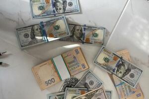 Правоохранители изъяли более 70 печатей и штампов медицинских учреждений, около 500 тыс. грн и $12 тыс.