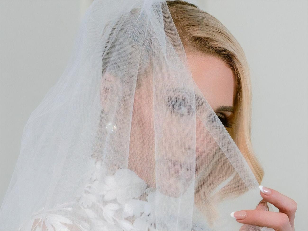 В день свадьбы Хилтон сменила четыре наряда