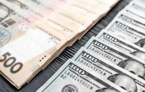 Курс гривны к доллару упал с 27,25 грн/$ до 27,27 грн/$