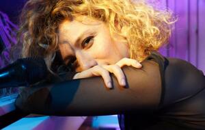 Розенфельд 2010 року стала фіналісткою шоу "Україна сльозам не вірить", а 2013-го вийшла у фінал проєкту "Як дві краплі"