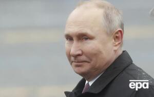 Часть детей несла портреты Путина