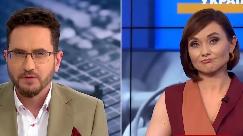 Лица ведущих телеканала после появления голой женщины в прямом эфире