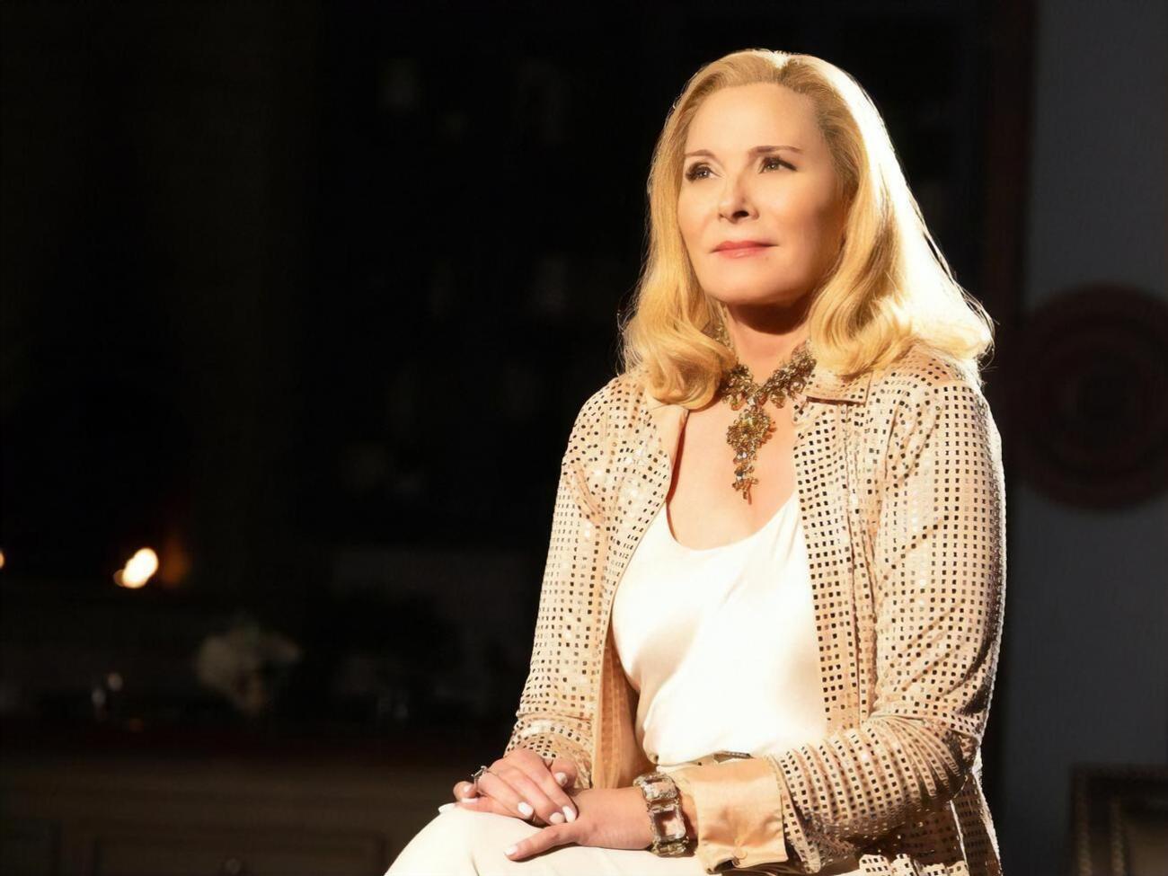 Кетролл народилася 1956 року у Великобританії