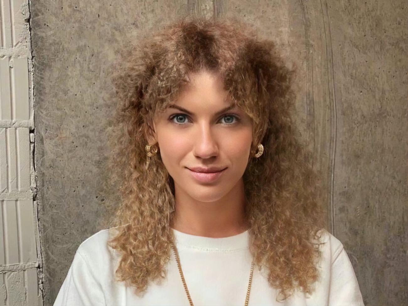 Этот вариант прически Никитюк назвала "накрутка на бумажки"