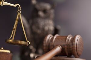 Суд визнав бойовика винним за двома статтями Кримінального кодексу України