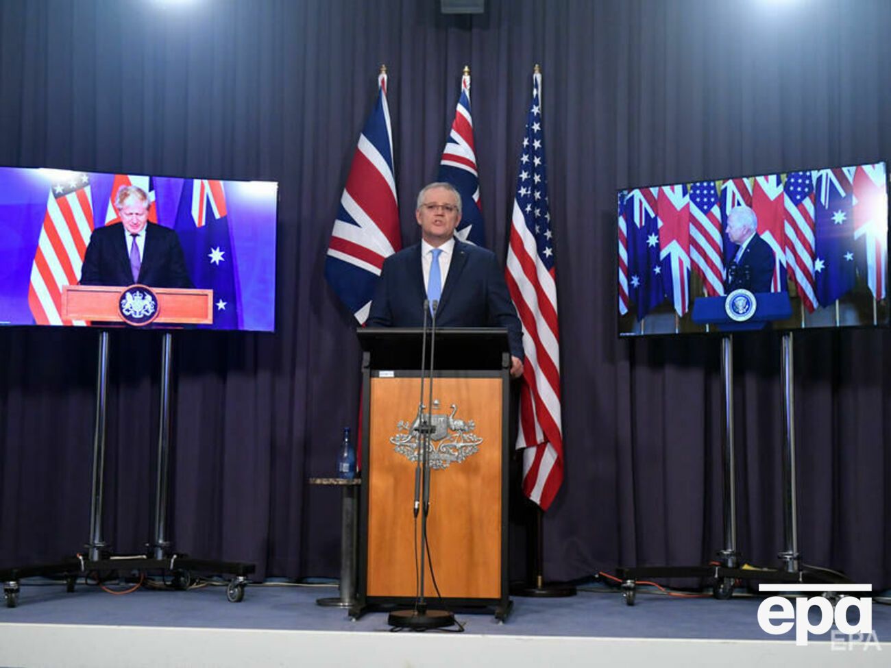 Джонсон (слева), Моррисон (по центру) и Байден (справа) объявили о создании AUKUS