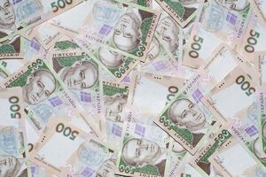 Гривня щодо долара подешевшала на три копійки