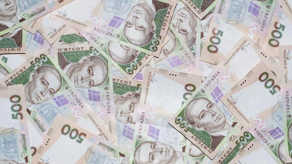 Гривня щодо долара подешевшала на три копійки