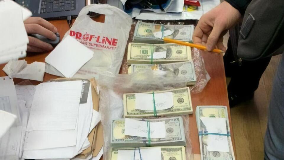 У прокурора при обыске нашли большое количество наличных