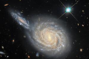На фото изображена спиральная галактика NGC 105, которая находится примерно в 215 млн световых лет от Земли