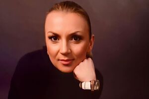 Белоконь играет роль матери Верки Сердючки, в образе которой выступает Данилко