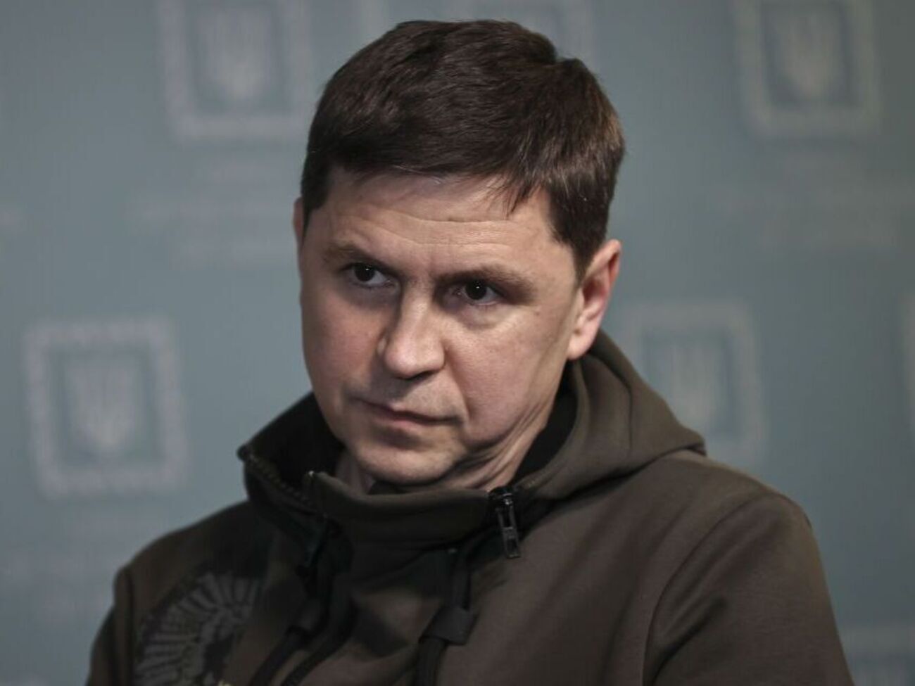 Подоляк обратил внимание Меркель на то, что Россия является страной-агрессором, а не гарантом мира