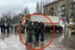 Раздача "гуманитарки" происходила под дулами автоматов