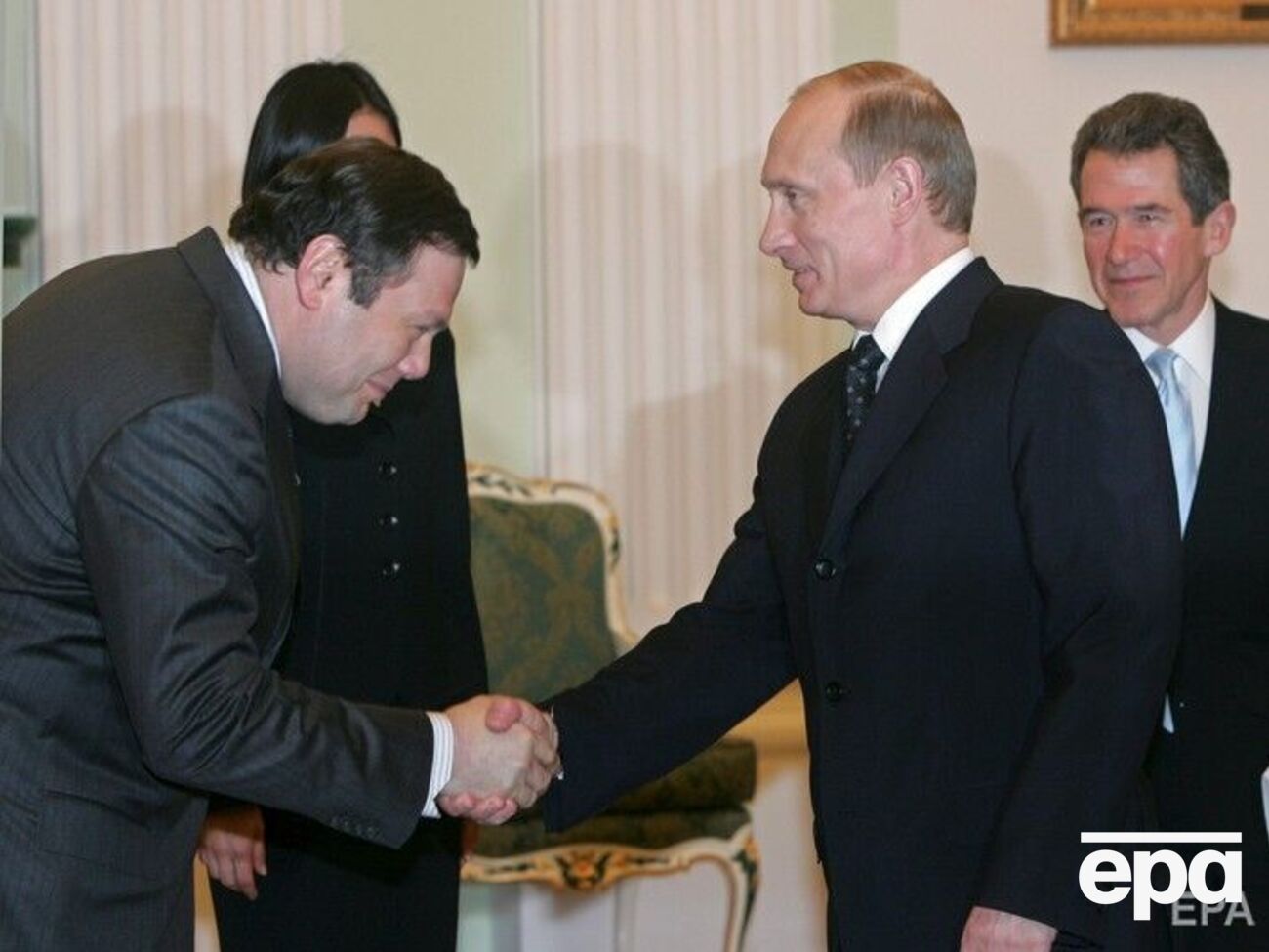 Фридмана (слева) считают одним из близких к Путину бизнесменов