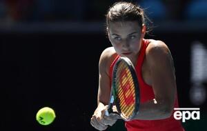 Костюк (на фото) играет в паре с теннисисткой из Румынии