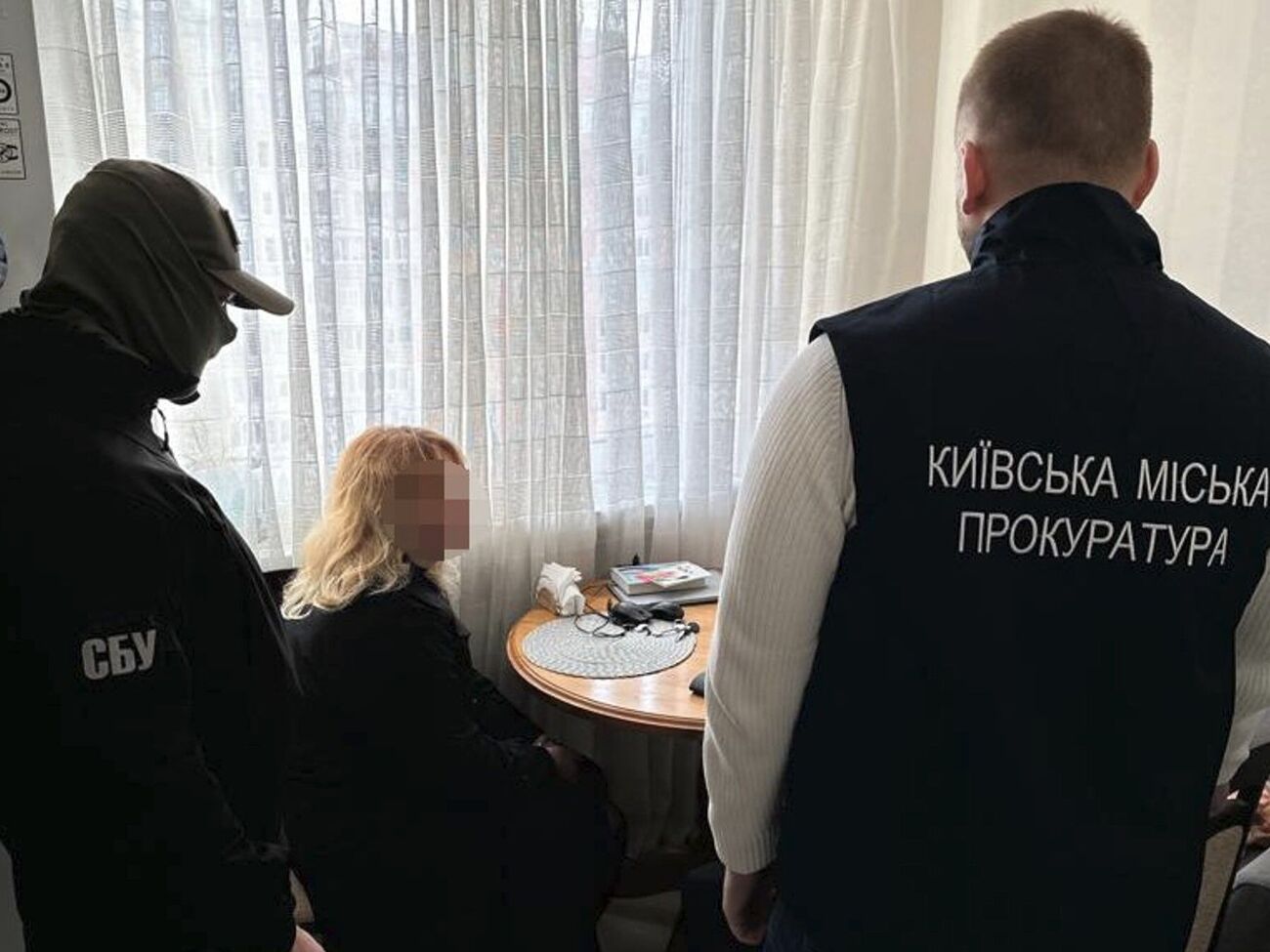 Чиновниця РДА у Києві координувала інформаційну пропагандистську діяльність Азарова, зазначили у прокуратурі