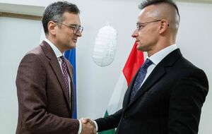 Фото со встречи с Кулебой показал Сийярто