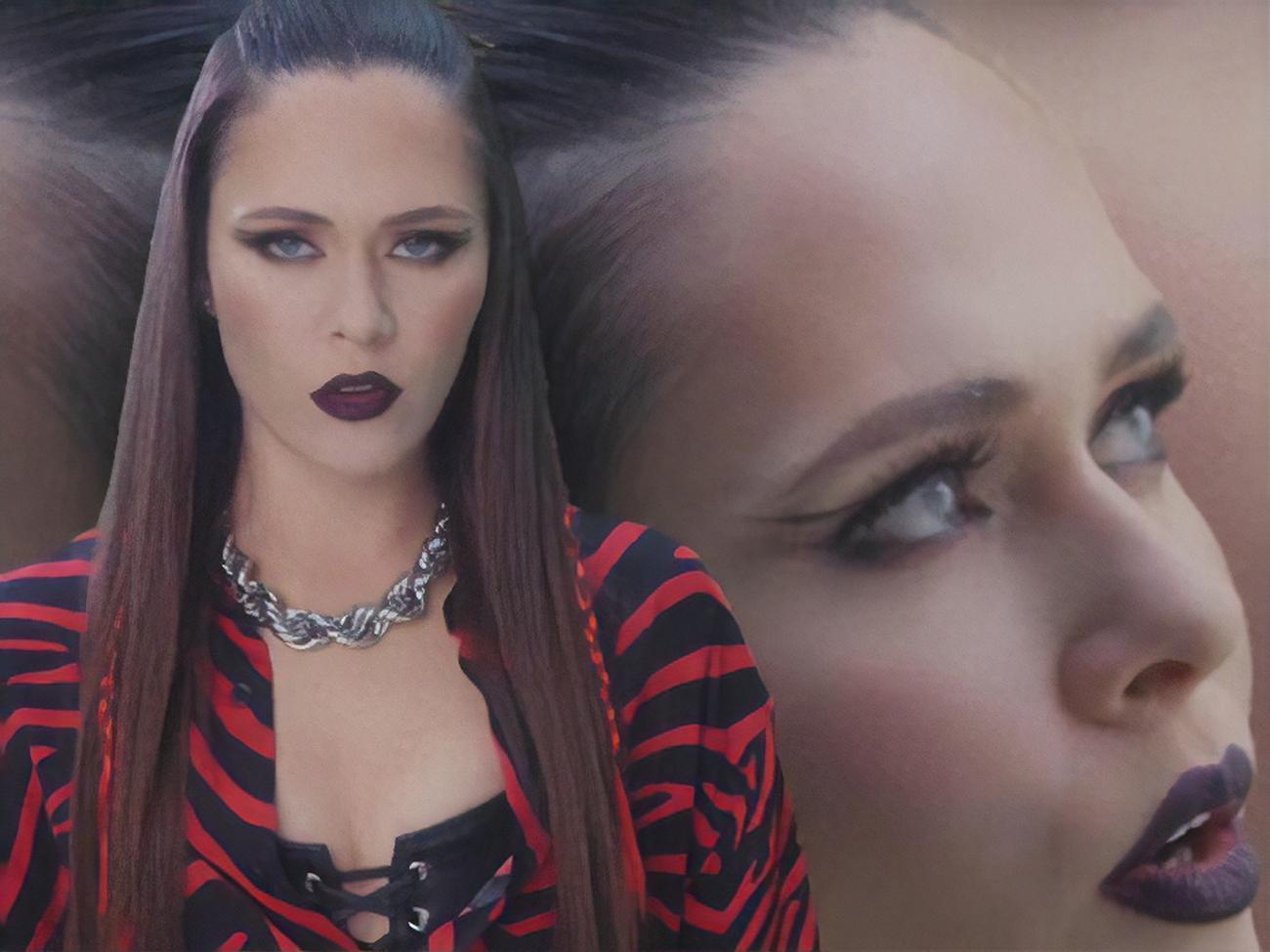 Фронтвумен The Hardkiss Саніна в ролику виконує пісню на тлі власного зображення