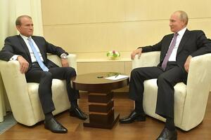 Бєлковський вважає, що Путін (на фото праворуч) довіряє Медведчуку (на фото зліва)