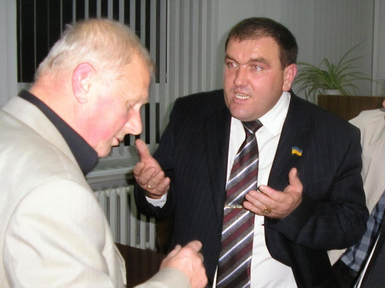 Андрусенко согласился, что Поворознюк (на фото справа) был рэкетиром