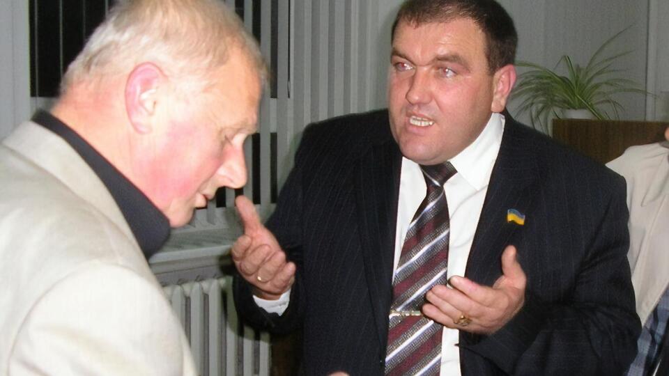Андрусенко согласился, что Поворознюк (на фото справа) был рэкетиром
