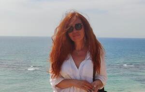 Біля Стіни Плачу люди тихо моляться різними мовами, але, стоячи там, я двічі встигла почути слово "перемога"