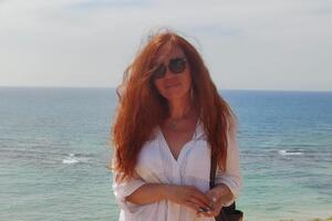 У Стены Плача люди тихо молятся на разных языках, но, стоя там, я дважды успела расслышать слово "Перемога"