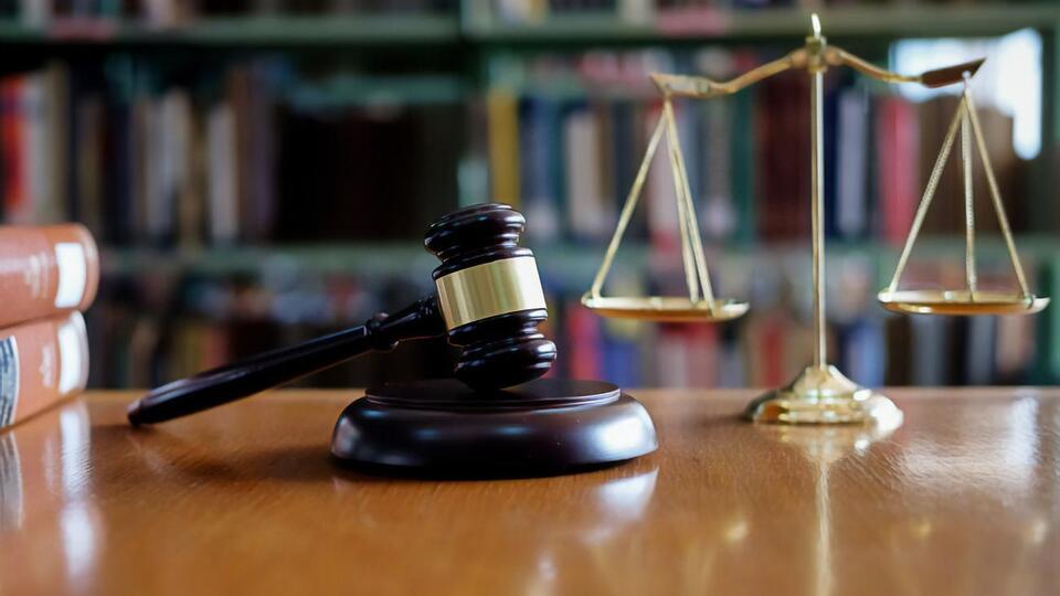 Суд визнав бойовика винним за двома статтями Кримінального кодексу України