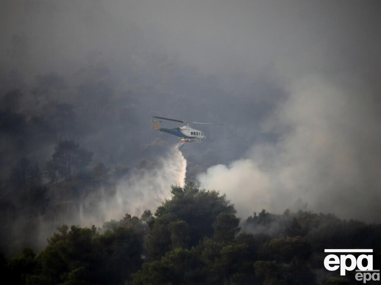 Из-за жары начались масштабные лесные пожары в Греции. С острова Родос эвакуировали 30 тыс. человек. Фоторепортаж