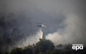 Из-за жары начались масштабные лесные пожары в Греции. С острова Родос эвакуировали 30 тыс. человек. Фоторепортаж