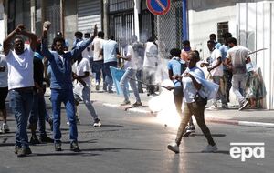 В Израиле беженцы из Эритреи устроили массовые столкновения на почве политики, пострадала полиция. Фоторепортаж