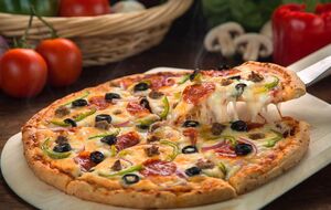 Пиццу выпекайте 20 мин. при 200 °С