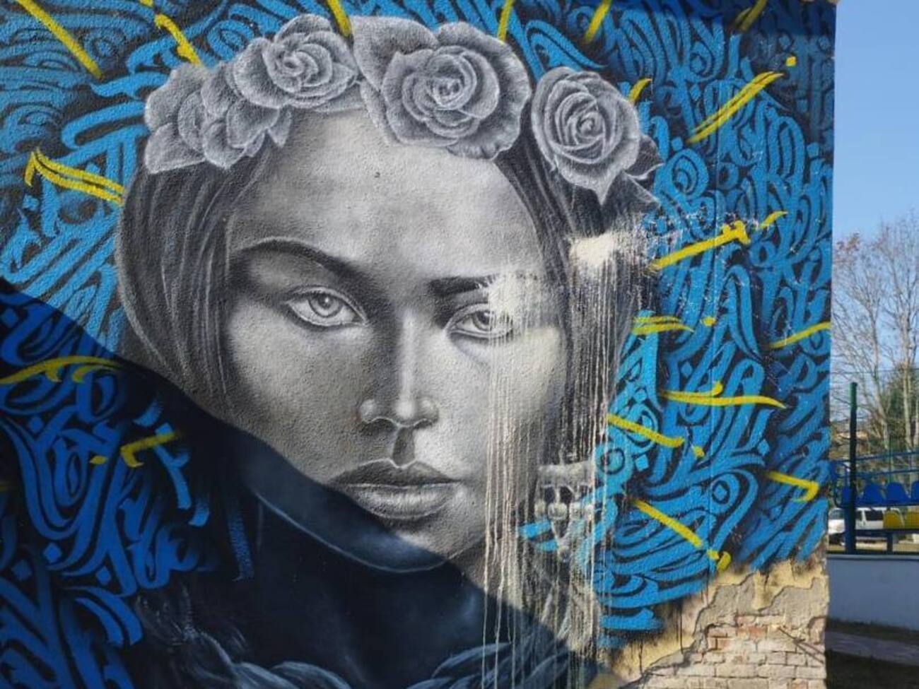 Мурал на стене дома культуры в Буче создали художники из США