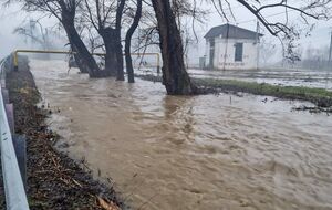 Через сильні опади стався перелив води через автомобільні дороги регіону
