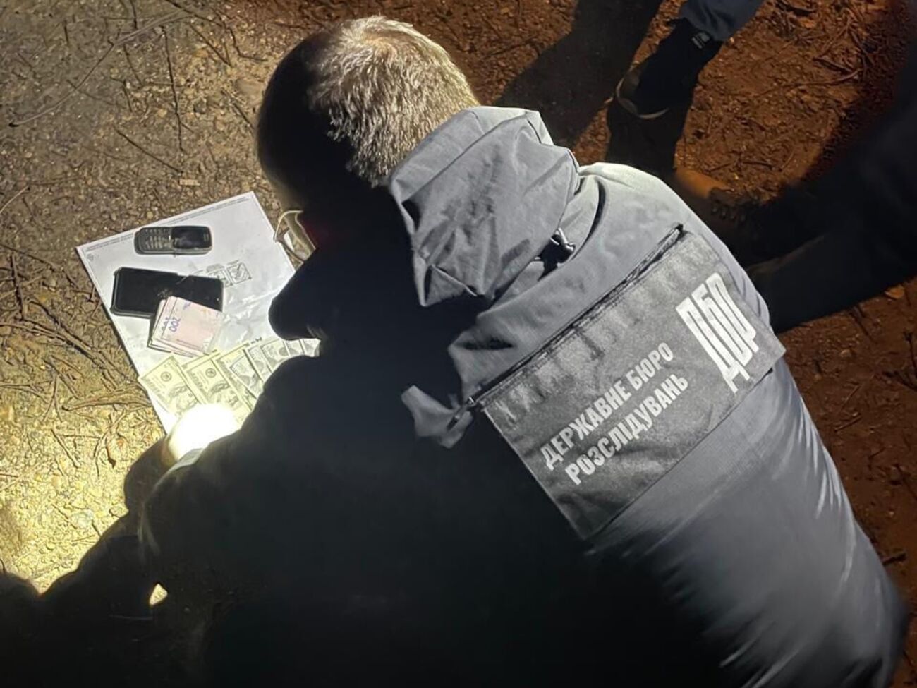 По данным ГБР, подозреваемые оценивали отсрочку в $4,5 тыс.