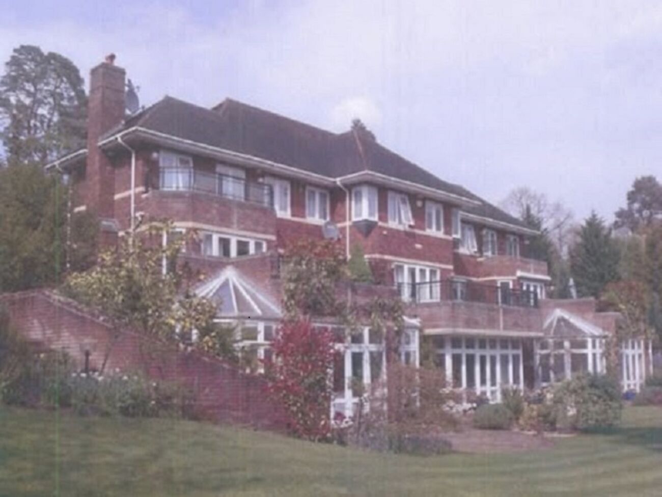 "Виллу Танглвуд", принадлежавшую Сергею и Елене Тищенко, продали по процедуре банкротства