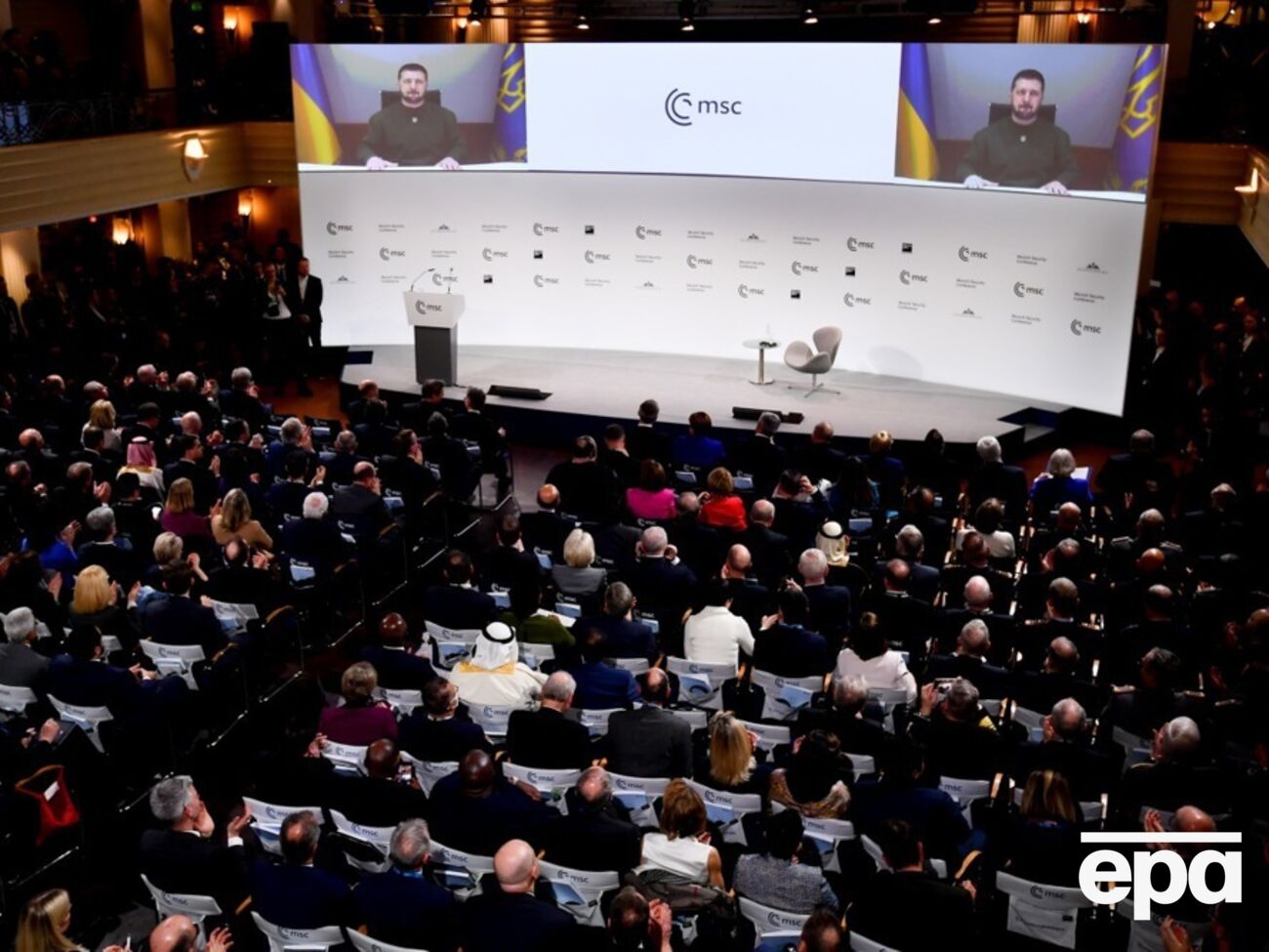 2023 року Зеленський виступав у Мюнхені за допомогою відеозв'язку