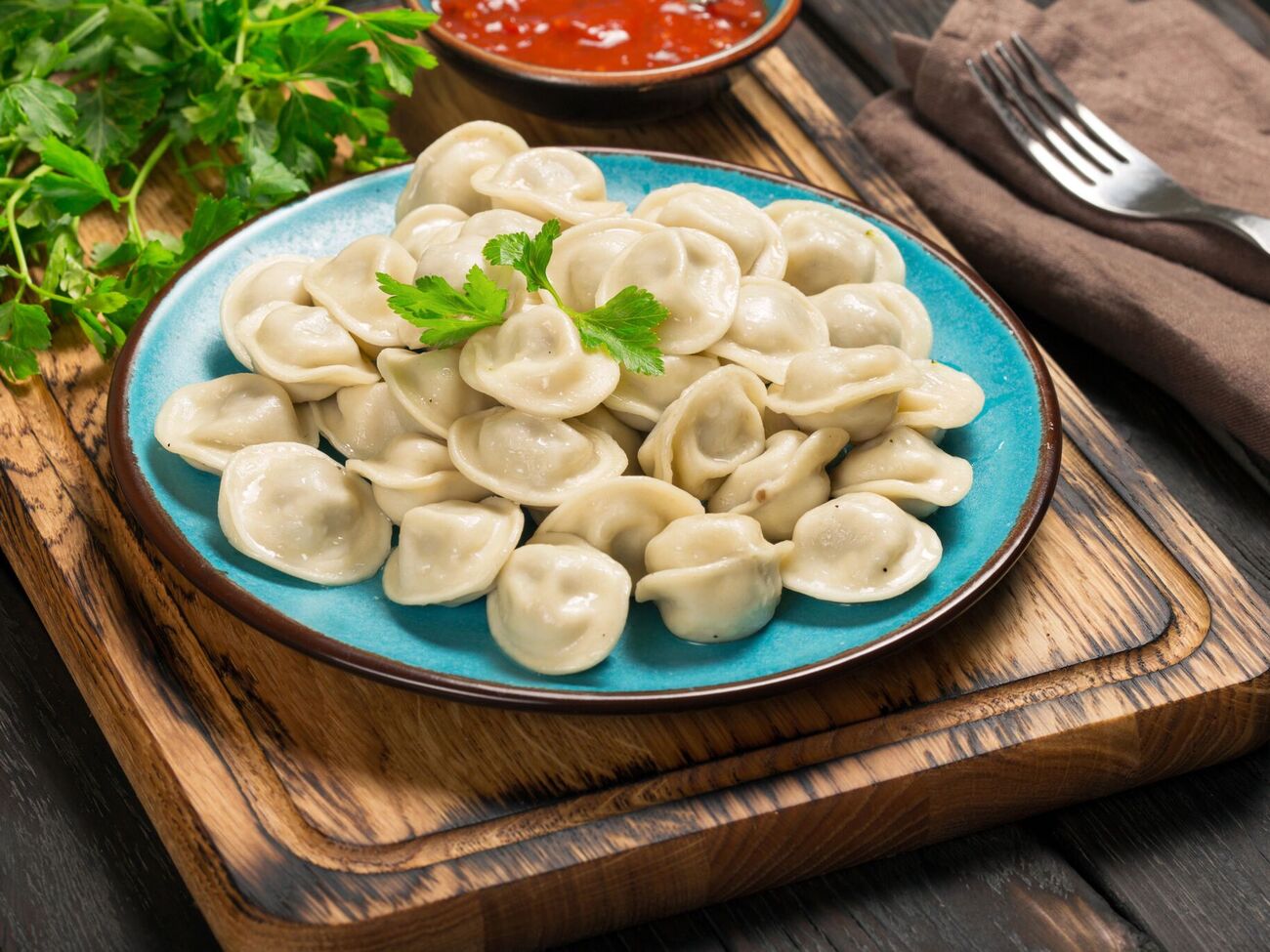 Во время приготовления на одну часть пельменей нужно взять три части воды