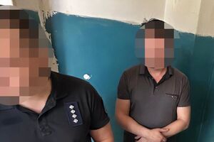 Голову ВЛК і його спільницю затримали під час поділу оплати за черговий "білий квиток"